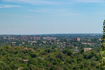 Fototapeta na wymiar Scenic city view from the hill. 