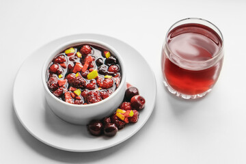 Fruit salad and juice on white background. Healthy breakfast concept.