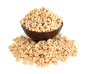 healthy cereal rings in wooden bowl on white