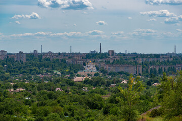 Fototapeta premium Scenic city view from the hill. 