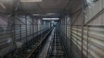 moving escalator in subway station Wat Phra That Doi Suthep Chiang Mai thailand