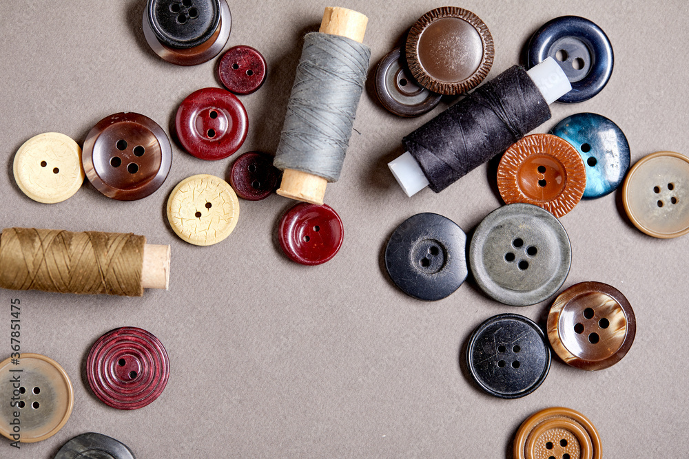 Aufkleber Background and texture of multicolored antique buttons