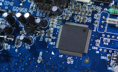 Printed Circuit Board with many electrical components. Electronic circuit, microchip on board