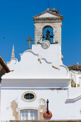 Arco da Vila, one of the medieval gates of the city walls where to see stork nests in Faro,...
