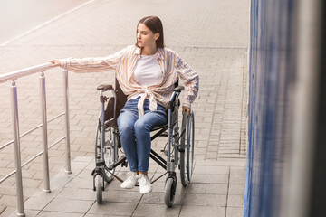 Young woman in wheelchair outdoors