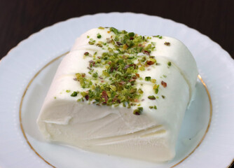Milk ice cream. Handmade ice cream with pistachio nuts. Maras ice cream. (Maras Dondurmasi)