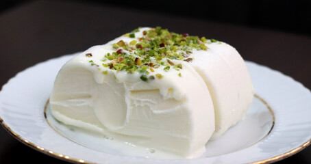 Milk ice cream. Handmade ice cream with pistachio nuts. Maras ice cream. (Maras Dondurmasi)