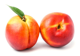 Sweet ripe nectarines on white background