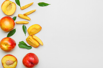 Sweet ripe nectarines on light background