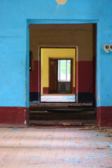 corridor with door openings in an abandoned building