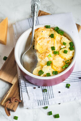 Potato gratin, casserole with cheese and potatoes