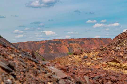 Ukraine, Krivoy Rog, unique place called "Ukrainian Mars". Waste rocks create multicolored mosaic. Open mine site with rare earth materials.