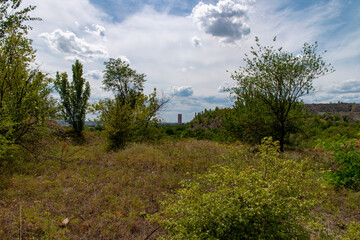 Fototapeta na wymiar Ukraine, Krivoy Rog, the 16 of July 2020. Abandoned city park with beautiful clouds in the sky.