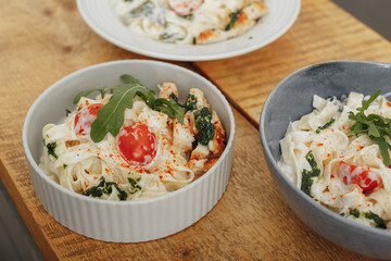 handmade fresh pasta with cheese and tomatoes
