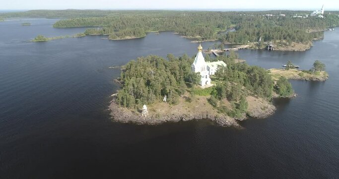 Beautiful Orthodox Church on a clear sunny day on Valaam Island. Nikolsky Skete. Church of St. Nicholas. famous monasteries of Russia. View from above. Ariel View.