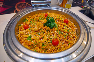 Pasta Fusilli with tomatoes, beef and basil.