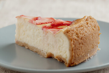 Delicious cheesecake with strawberries, food photo.
