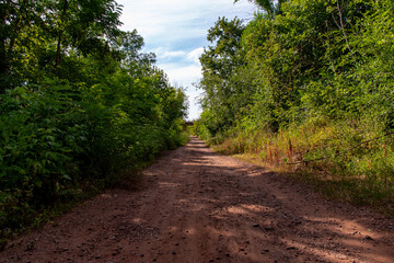 Ukraine, Krivoy Rog, the 16 of July 2020. Abandoned city park with an old bridge under the beautiful clouds in the sky.