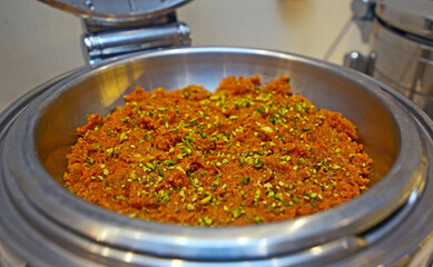 Carrot halwa on a golden plate. Gajar ka halwa