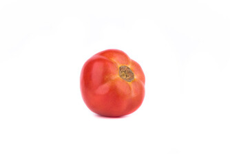 Ripe red tomato lying on its side over a white background.