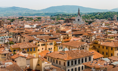 Fototapeta na wymiar Florentine Rooftops & Skyline with Santa Croce Church in Florence, Italy