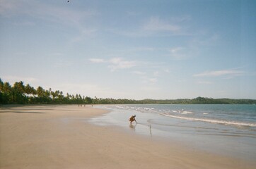 woman walking on the beach