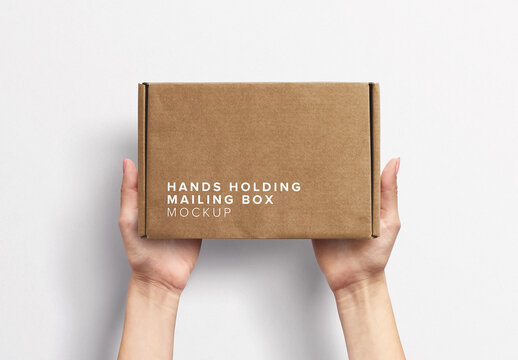 Hands Holding Postal Box Mockup