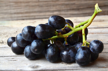 Fresh ripe bunch of grapes ready to eat close up.Grape background.Selective focus.