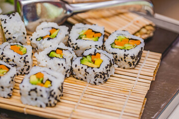 Overhead japanese sushi food. Maki ands rolls with tuna, salmon, shrimp, crab and avocado. Top view of assorted sushi, all you can eat menu. Rainbow sushi roll, uramaki, hosomaki and nigiri.