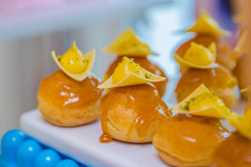 Cheese, honey and sweet bread in a dessert buffet