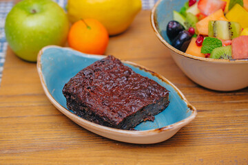 Brownie cake pieces in white plate