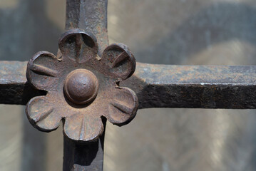 old and modern decorative forged metal elements of fences, gates, window gratings