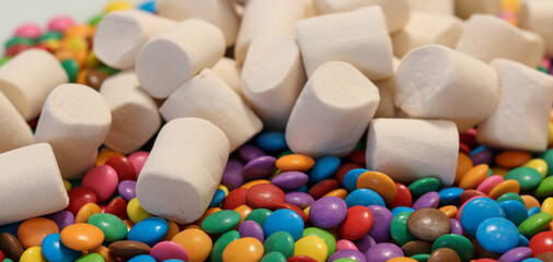 Different sweets decorating a beautiful party table.