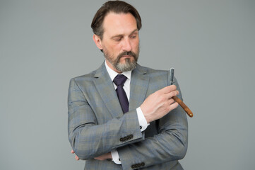 Man shaving straight razor grooming beard, barbershop salon concept