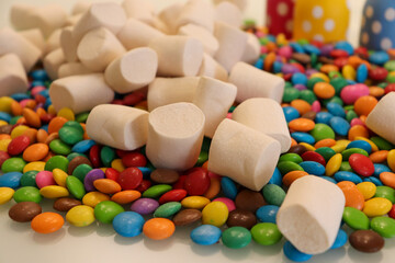 Different sweets decorating a beautiful party table.