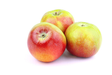 Three apples on a white background. Healthy food. Ripe organic apple