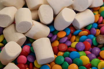 Different sweets decorating a beautiful party table.