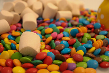 Different sweets decorating a beautiful party table.