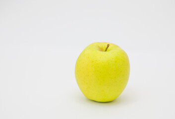 Yellow apple isolated on white background