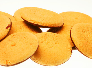 chocolate cookies over white background