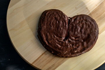 chocolate palm tree, on top of wooden board, with copy space