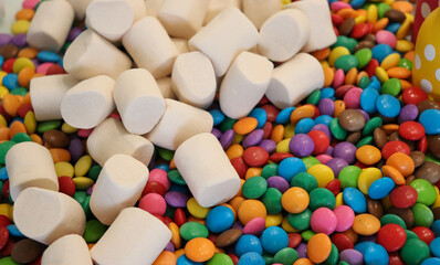 Different sweets decorating a beautiful party table.