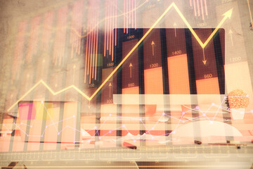 Multi exposure of financial graph drawing and office interior background. Concept of market analysis.