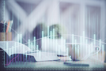 Multi exposure of forex graph drawing and desktop with coffee and items on table background. Concept of financial market trading