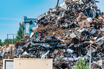 Heap scrap, metal rubbish warehouse in a recycling company. Base of reception scrap.