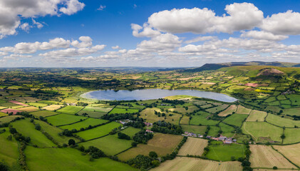 Aerial view of a lake and farmland © whitcomberd
