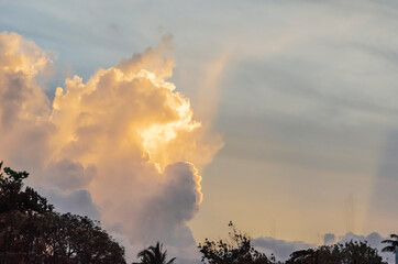 Evening Sunlight Filtered In The Clouds