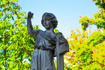 closeup grave angel old tombstone