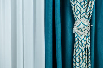Close up of a curtain. part of the drapery by the window. Tulle for windows