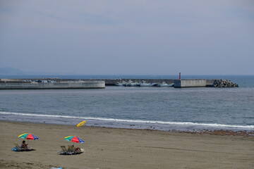 Kamakura Japan - Koshigoe Beach and Fishing Port in backgroung